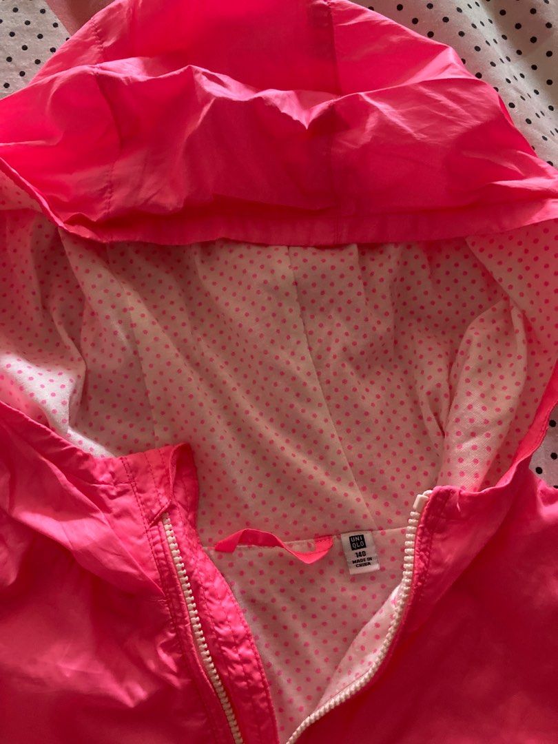Fuchsia Uniqlo Raincoat with polka dot lining (Category: Babies & Kids Fashion) located in San Juan City. Submitted by ohdeedoh (Listing ID 1245812532, Image 2). Description: Your daughter will be a bright ray of sunshine in the rain in this eye-catching raincoat with adorable polka dot lining. Size 140 Uniqlo.