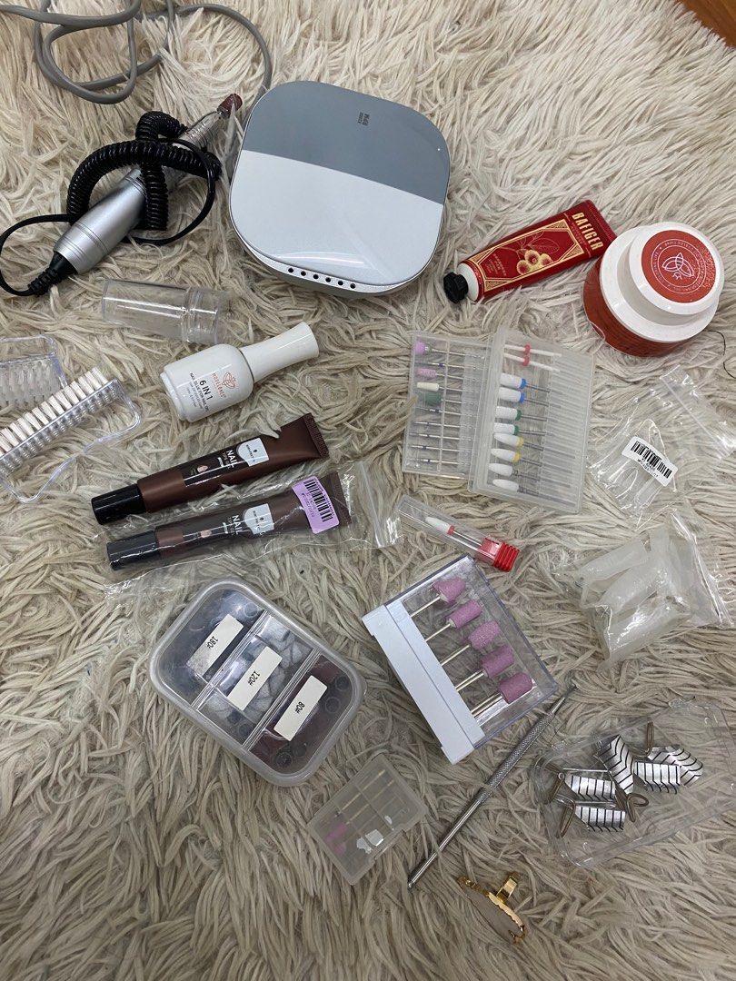 GEL NAIL SET (Category: Hands & Nails) located in Manila. Submitted by _nancyh_ (Listing ID 1245825793, Image 1). Description: it comes with : - nail bits - nail drill (high quality worth 2k) - builder gel - nail extension tools - brushes - nail glue - hand lotion - bag RFS: not interested anymore for this super steal na:))) RFS : not my passion anymore .