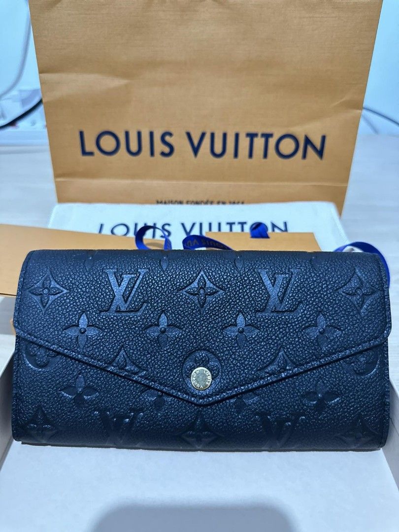 Louis Vuitton (Sarah) wallet on Carousell