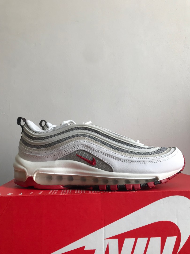 White 97s shop with red tick
