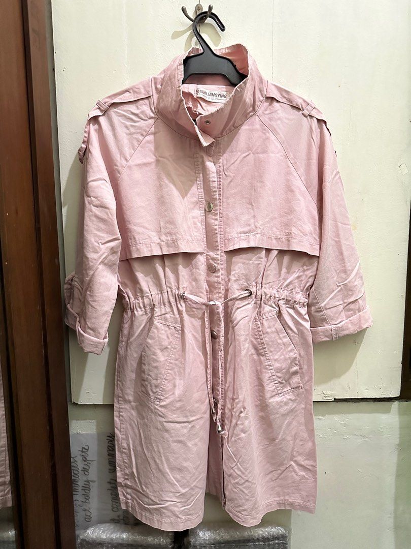 Pink Jacket (Category: Coats, Jackets and Outerwear) located in Pasig City. Submitted by sidequester (Listing ID 1245947801, Image 3). Description: Pink Coat sort of like trench coat Snap button with tie on the waist With pockets 🫶🏻.