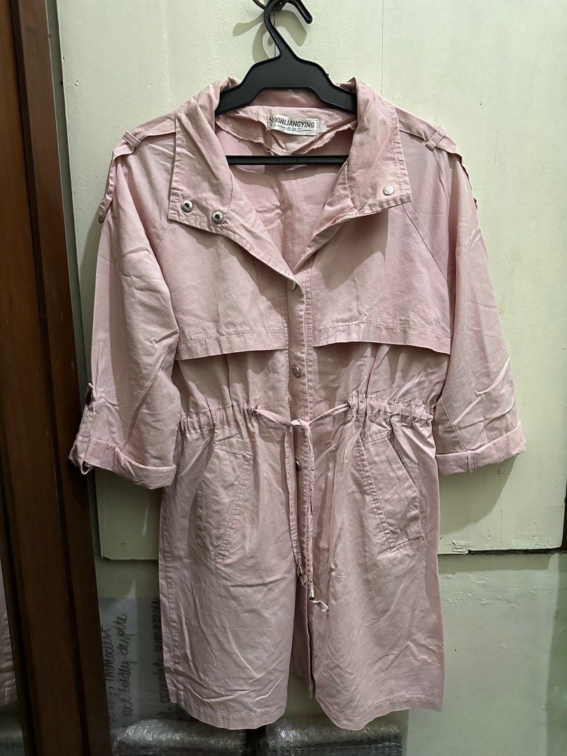 Pink Jacket (Category: Coats, Jackets and Outerwear) located in Pasig City. Submitted by sidequester (Listing ID 1245947801, Image 2). Description: Pink Coat sort of like trench coat Snap button with tie on the waist With pockets 🫶🏻.