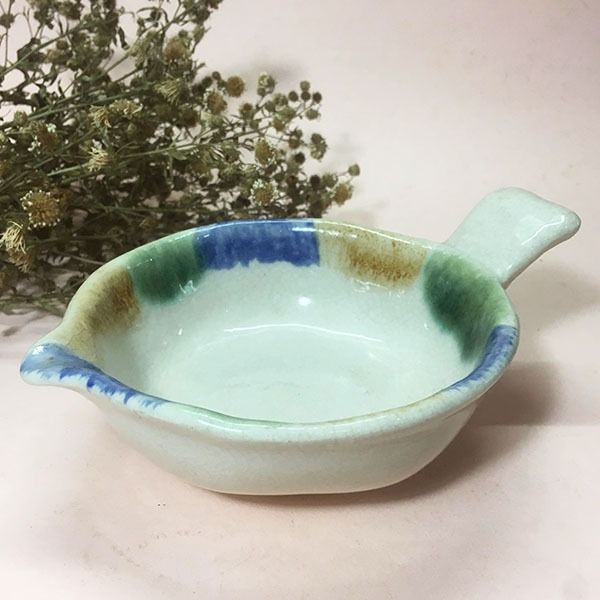 Spouted Fish Shaped Bowl (Category: Dinnerware & Cutlery) located in Mandaluyong City. Submitted by yula_noveltyfinds (Listing ID 1245953459, Image 1). Description: - Japan surplus - stoneware bowl - crackled glazed finish - Good condition / like new - can be used for soup and sauces - size approx: 5"(W) x 6.5" (L) x 2.5" height These are surplus items please manage your expectations, thank you. Actual product color may vary from the images shown