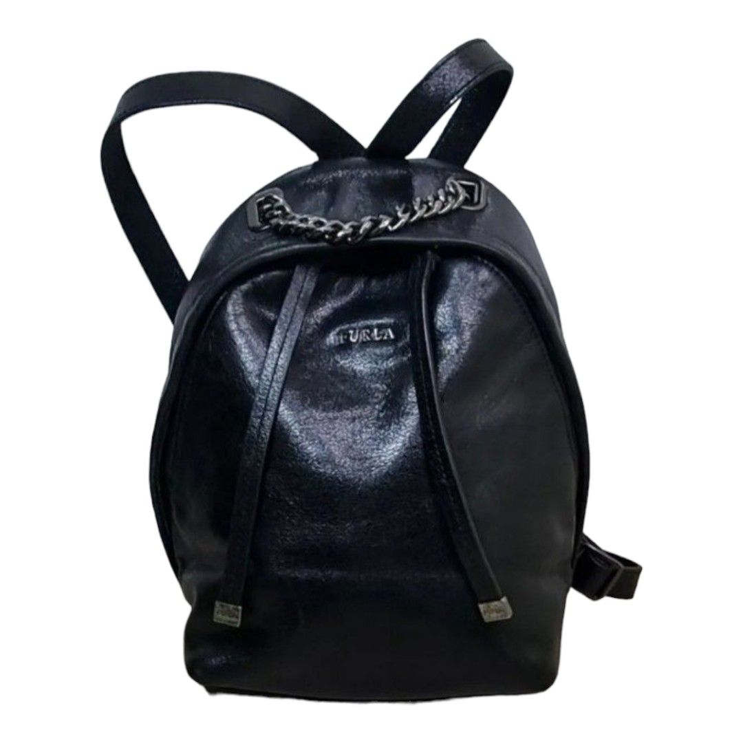 Authentic FURLA backpack mini (Category: Luxury Bags & Wallets) located in Quezon City. Submitted by manerarestorationservices (Listing ID 1213894464, Image 1). Description: SALE SALE SALE❗️❗️❗️10,500php 🧼🧿8,800PHP🧿🧼 Money back Guarantee 💯% Guaranteed authentic *Brand: FURLA *Color: BLACK CALFSKIN *Size: MINI *Condition: 8/10 HAS NEVER BEEN SPA -Used * Inclusions: BAG WITH PROVIDED Dustbag 10 : Brand-new or New with tag 9 : Like new,only use