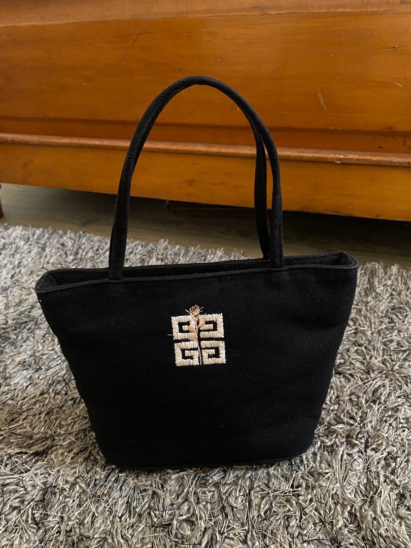 Authentic Givenchy Mini Canvass Handbag (Category: Luxury Bags & Wallets) located in Manila. Submitted by msbelleph (Listing ID 1240847995, Image 1). Description: Pwede sa baby girls niyo or sa ladies na mahilig sa cute kikay bag❤️ LOW BALLERS will NOT be entertained. Please be reasonable when haggling :) ▪️Meet up at Sun Mall Welcome Rotonda and SM San Lazaro only ▪️Grab Express or Lalamove ▪️Ships nationwide via LBC- COD/COP accepted ▪️Ships in