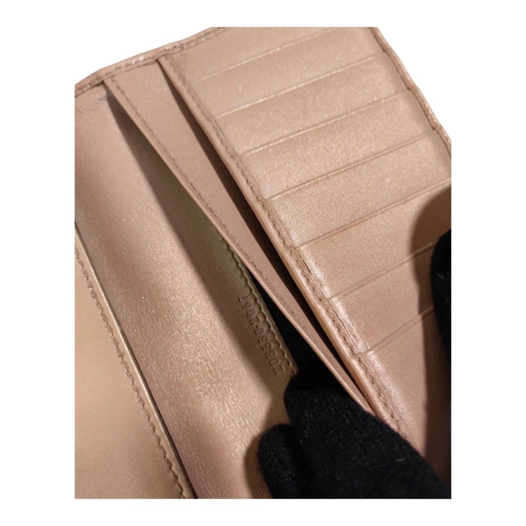 Authentic guccissima Compact wallet (Category: Luxury Bags & Wallets) located in Quezon City. Submitted by manerarestorationservices (Listing ID 1235053195, Image 3). Description: Money back Guarantee 💯% Guaranteed authentic *Brand: G***Issima double sided flap wallet *Materials: monogram calfskin leather *Color: metallic peach *Size: long *Condition: 8/10 color toych up Pls see photos -Used * Inclusions: wallet w/ box 10 : Brand-new or New with