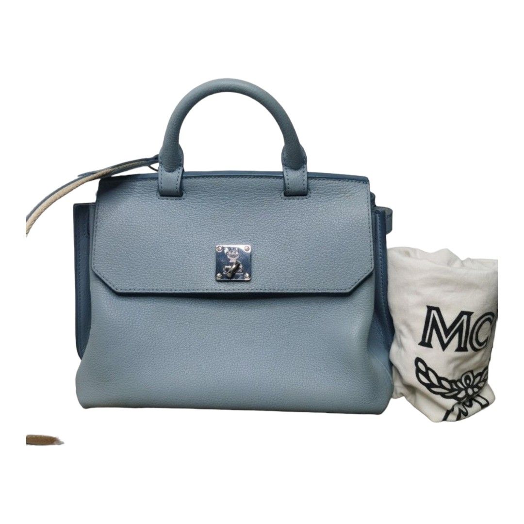 authentic MCM milla (Category: Luxury Bags & Wallets) located in Quezon City. Submitted by manerarestorationservices (Listing ID 1216595146, Image 1). Description: SALE SALE SALE❗❗❗ Money back Guarantee 💯% Guaranteed authentic *Brand: MCM milla SUPER GANDA! *Materials: grained lesther *Color: powder blue *Size: small *Condition: 9/10 like new *Faws: missing one strap -Used * Inclusions: bag with dustbag 10 : Brand-new or New with tag 9 : Like ne