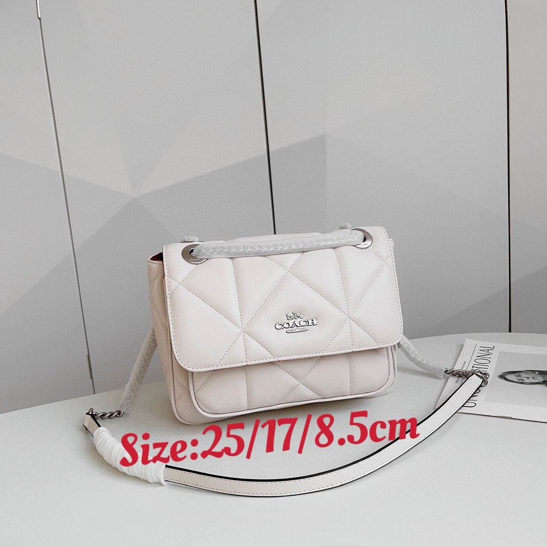 White coach clutch sales