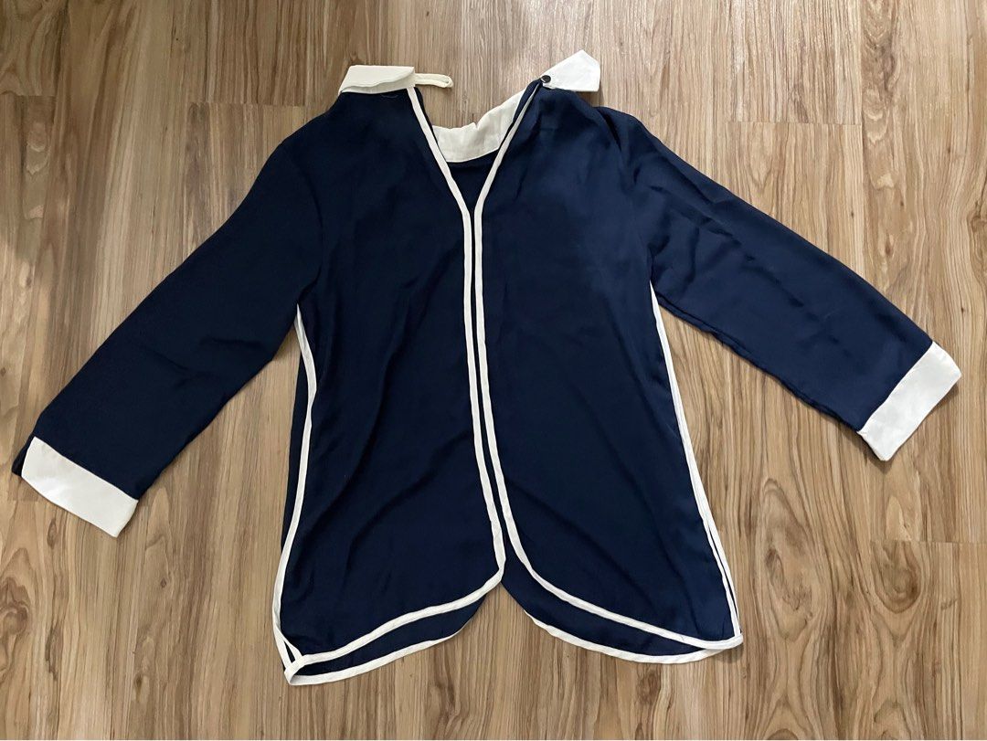 dark blue blouse (Category: Blouses) located in Rizal. Submitted by esquivel.declutter (Listing ID 1240855080, Image 1). Description: .