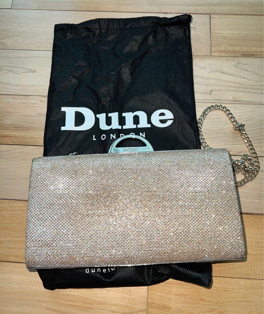 Gold clutch bag dune sale