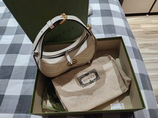 Half-moon-shaped mini bag with Interlocking G