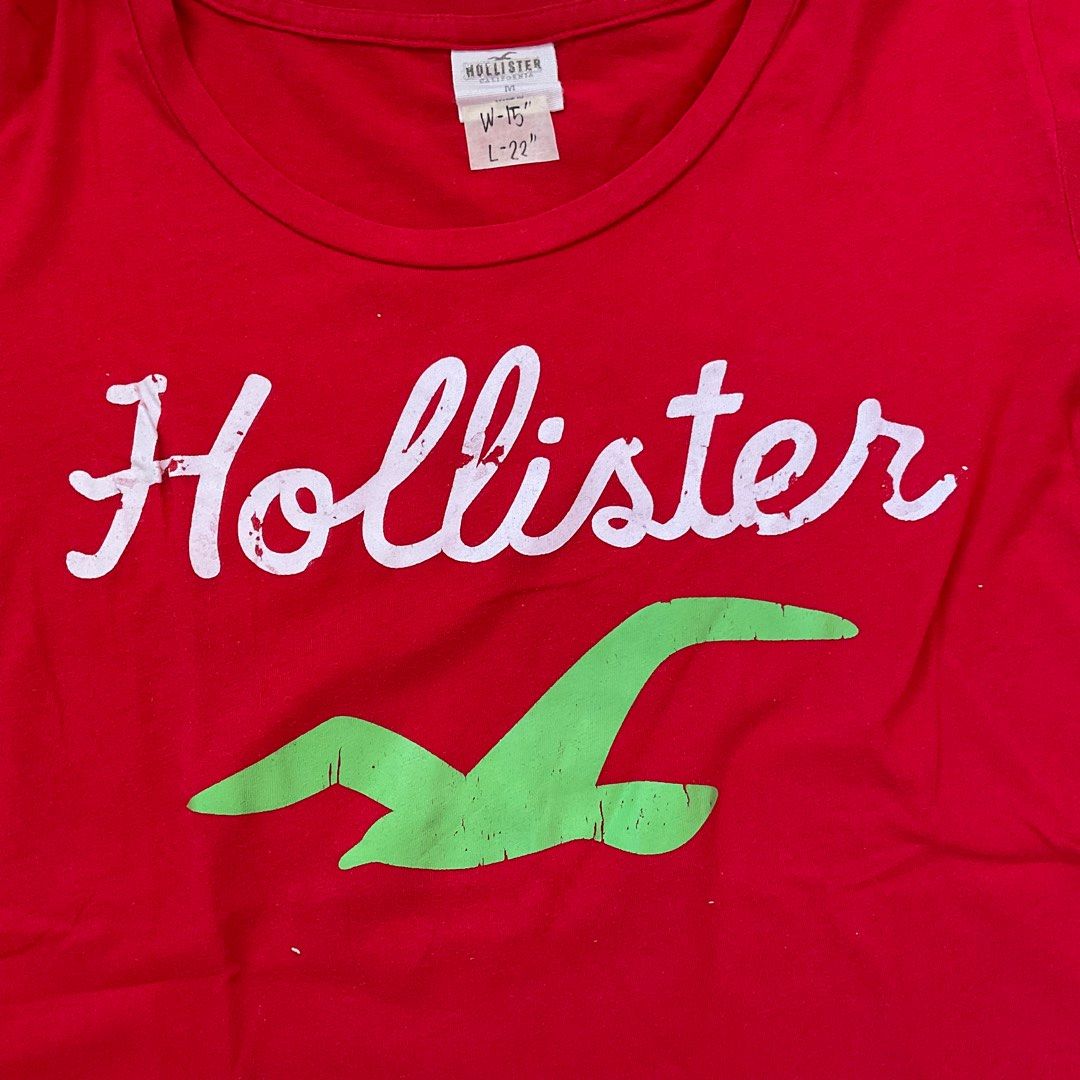Hollister Red Shirt (Category: Shirts) located in Rizal. Submitted by basicsrzl (Listing ID 1240882958, Image 3). Description: 👕 Dimensions - Size on tag medium - Width 15” - Length 22” - Condition 10/10 📍Location - Morong, Rizal 📦 Shipping - Shopee Checkout - J&T express delivery 💸 Payment - GCASH - First to pay gets the item 📝 Note No asking for additional photos, sold as is. .