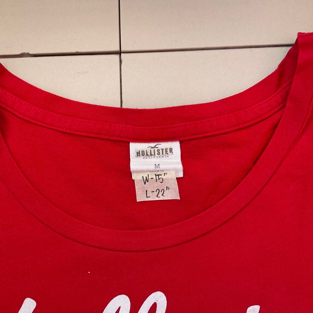 Hollister Red Shirt (Category: Shirts) located in Rizal. Submitted by basicsrzl (Listing ID 1240882958, Image 2). Description: 👕 Dimensions - Size on tag medium - Width 15” - Length 22” - Condition 10/10 📍Location - Morong, Rizal 📦 Shipping - Shopee Checkout - J&T express delivery 💸 Payment - GCASH - First to pay gets the item 📝 Note No asking for additional photos, sold as is. .