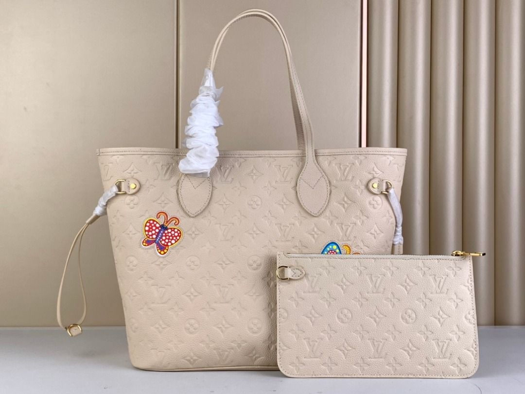 LV x YK Neverfull MM Monogram Empreinte Leather - Women - Handbags