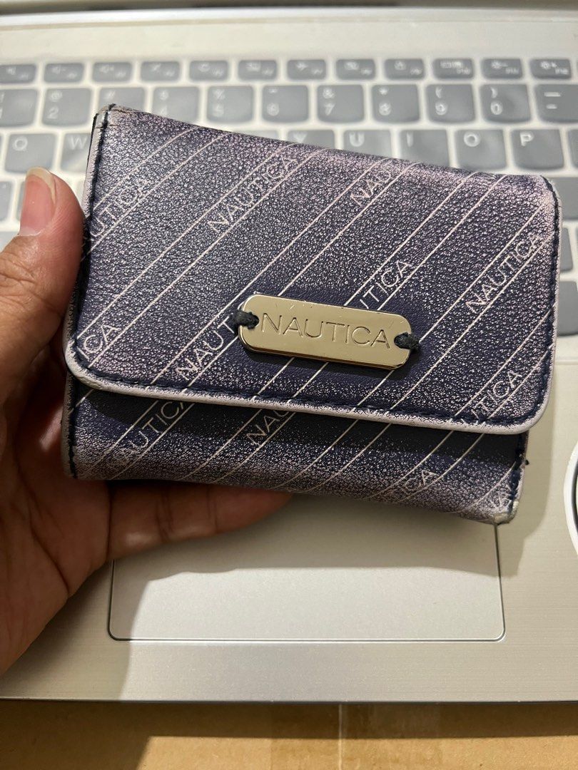 NAUTICA WALLET (Category: Wallets & Card holders) located in Makati City. Submitted by declutter_butter (Listing ID 1240877582, Image 1). Description: Original Nautica Wallet with RFID protection.
