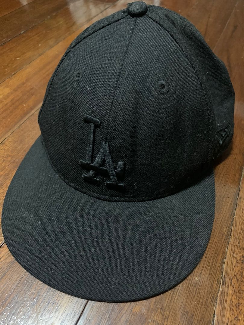 New Era caps (Category: Caps & Hats) located in Quezon City. Submitted by hellogoodbri (Listing ID 1240839946, Image 1). Description: Selling assorted New Era caps •Blue LA Dodgers- Size 7 1/8 inches (56.8 cm) ₱800 - SOLD •Black LA Dodgers- Size 6 7/8 inches (54.9 cm) ₱500 •Green Atlanta Braves- Size 7 inches (55.8 cm) ₱800 •Sex Pistols - 7 1/8 inches (56.8 cm) - SOLD - All authentic - RFS: decluttering - Message if interested or for inquiries.