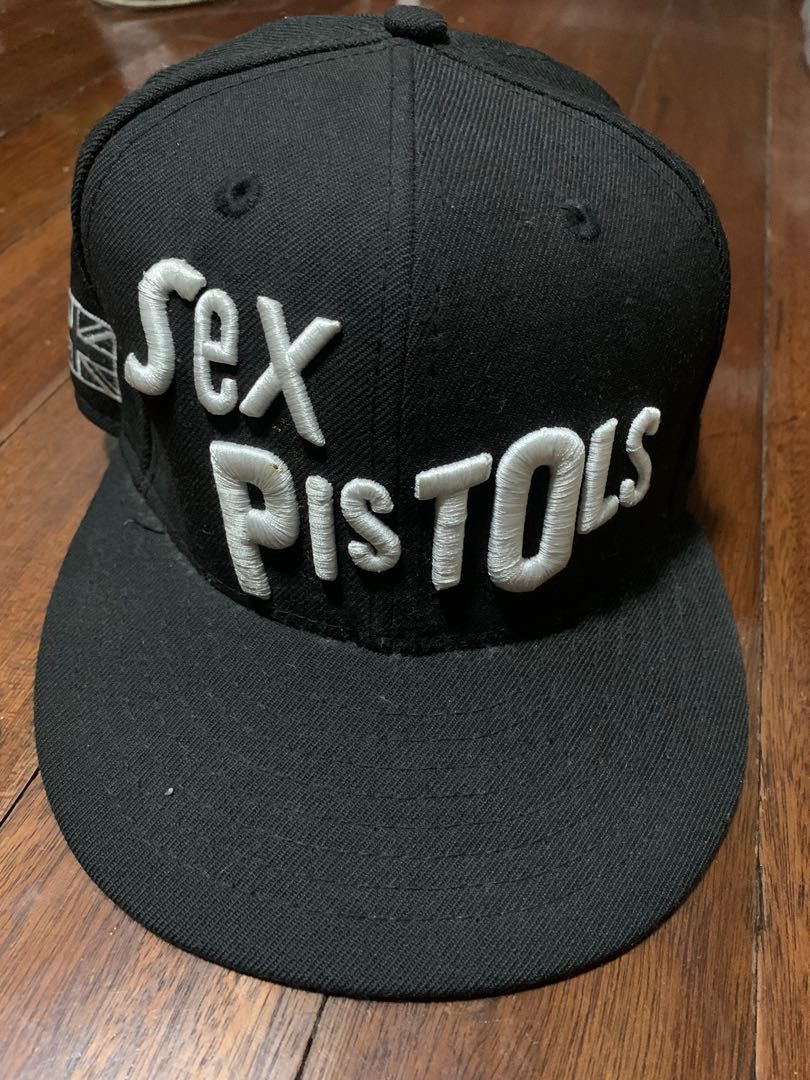 New Era caps (Category: Caps & Hats) located in Quezon City. Submitted by hellogoodbri (Listing ID 1240839946, Image 2). Description: Selling assorted New Era caps •Blue LA Dodgers- Size 7 1/8 inches (56.8 cm) ₱800 - SOLD •Black LA Dodgers- Size 6 7/8 inches (54.9 cm) ₱500 •Green Atlanta Braves- Size 7 inches (55.8 cm) ₱800 •Sex Pistols - 7 1/8 inches (56.8 cm) - SOLD - All authentic - RFS: decluttering - Message if interested or for inquiries.