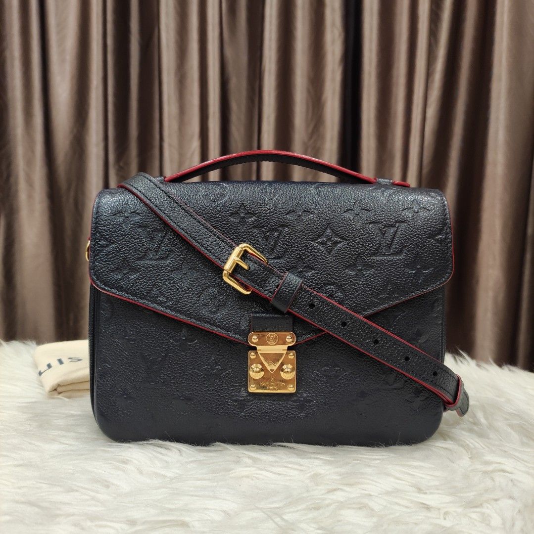Louis Vuitton  Pouchette Metis Empreinte leather 