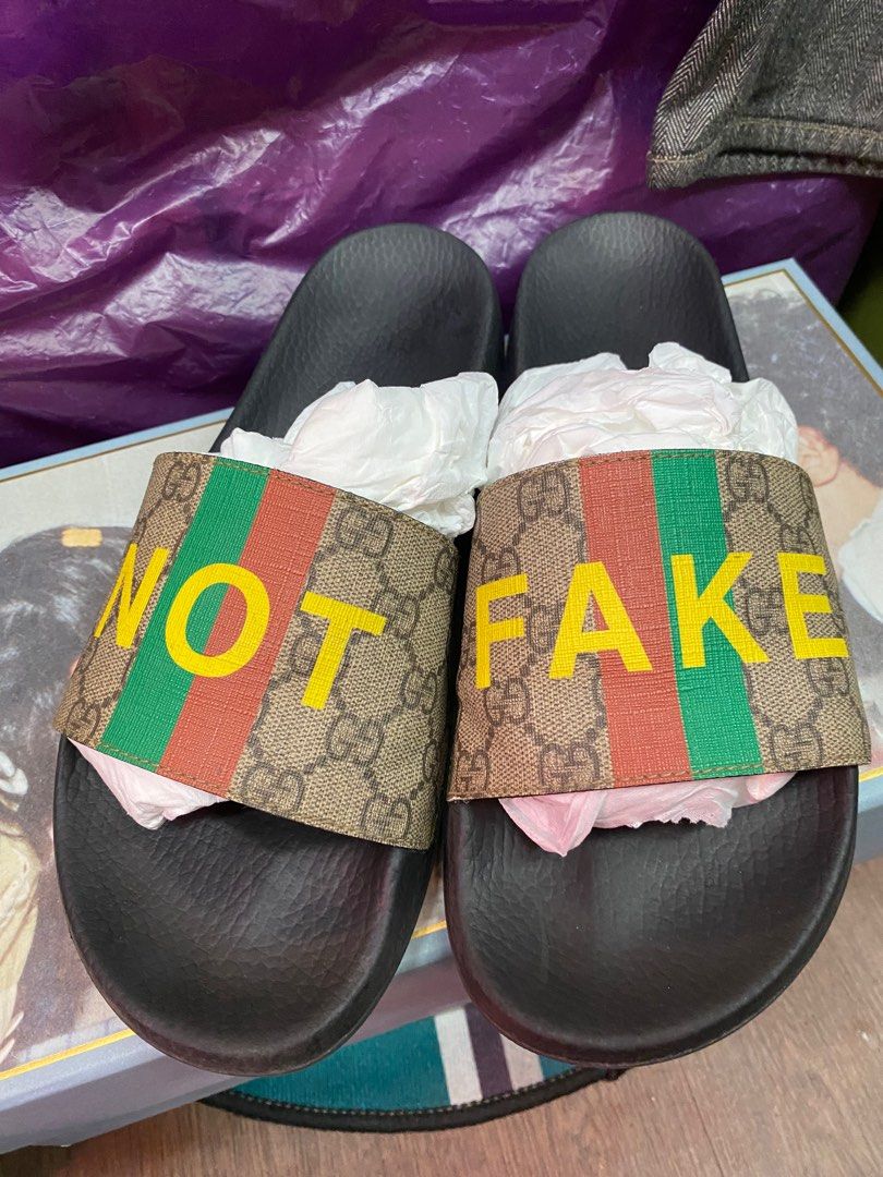 Fake deals supreme slippers