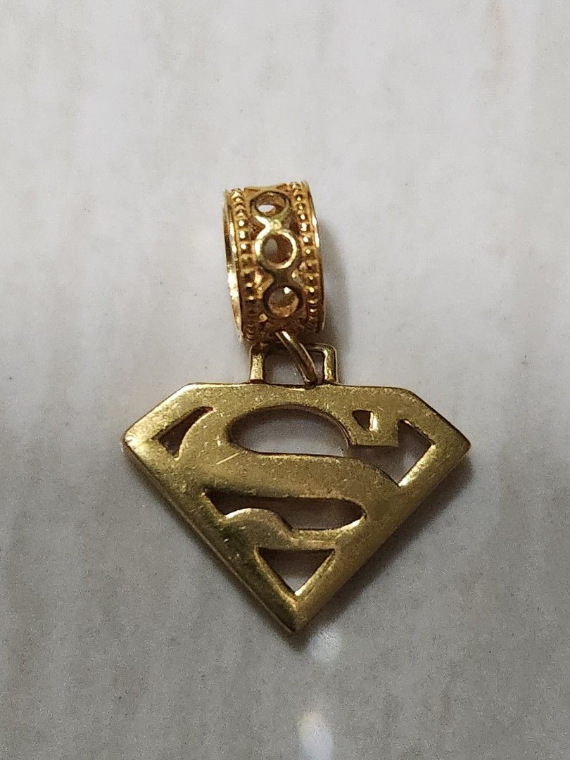 Gold superman pendant outlet
