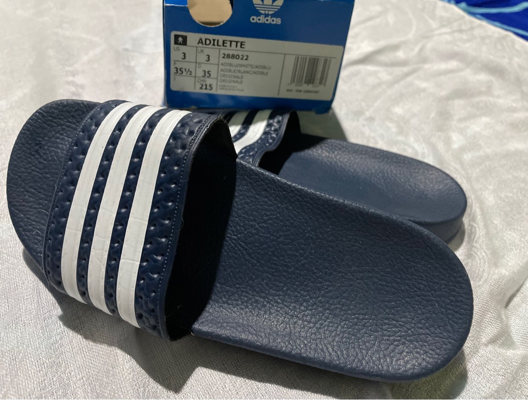 adidas costly slippers