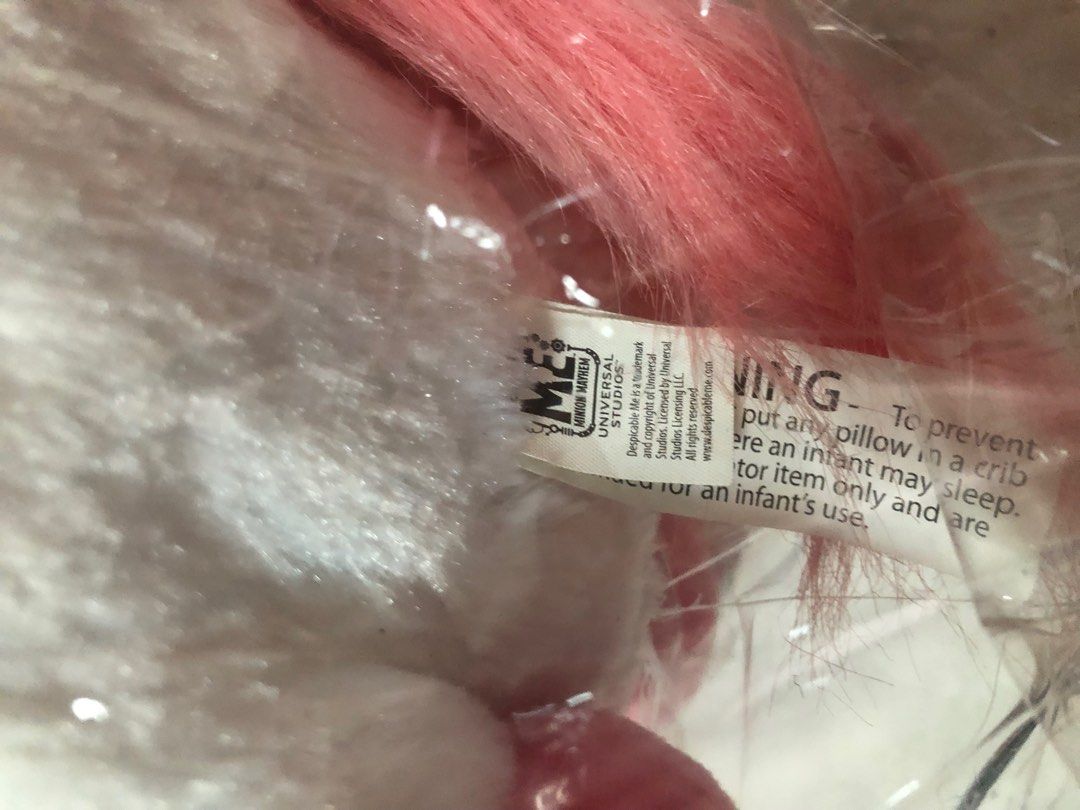 Despicable Me Fluffy Unicorn Plushie (Category: Plushies & Soft Toys) located in Cainta. Submitted by mydecluttershop (Listing ID 1246024072, Image 2). Description: Despicable Me plushie. Has minor flaws (see pic). Authentic item bought from Universal Studios..