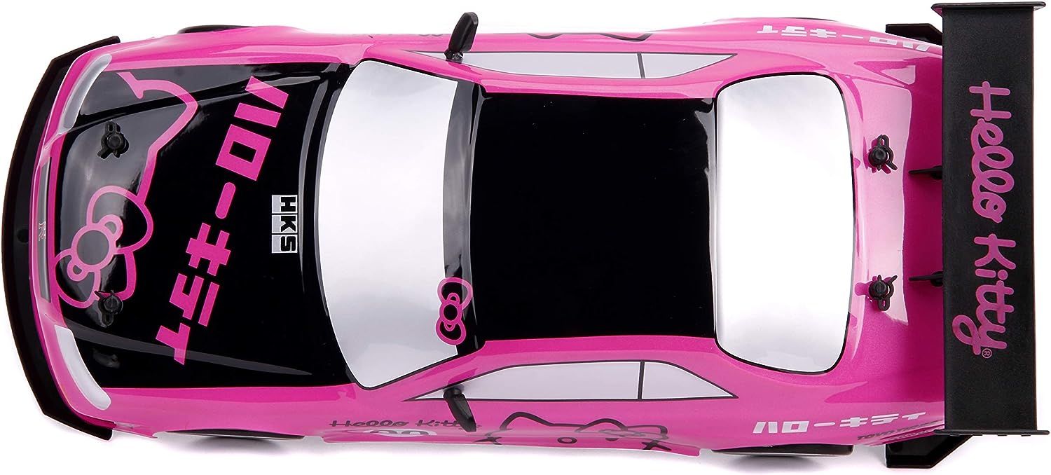 Jada Toys Hello Kitty Nissan Skyline GT-R (Bnr34) Drift Power Slide Elite  R/C, USB Charging, with 4 Extra Tires, Pink : : Toys