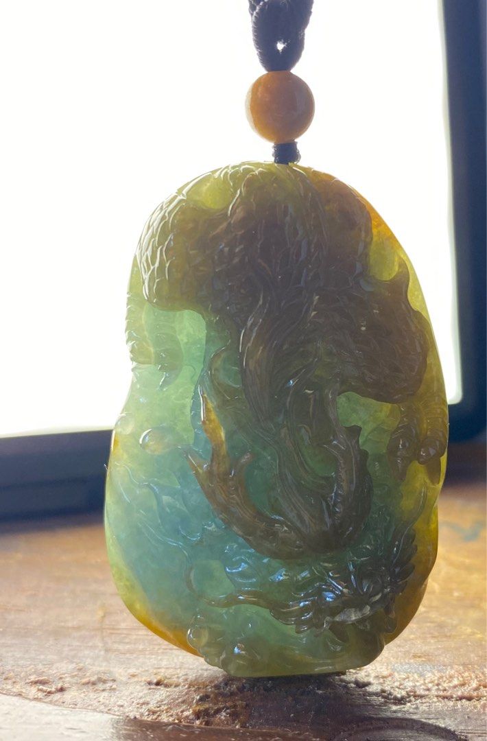 Carved jade outlet dragon pendant