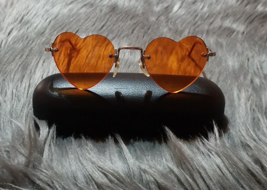 Cartier sunglasses online womens heart shaped