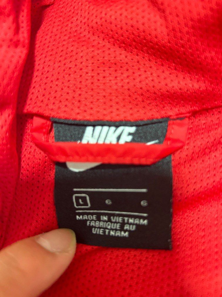 Red black and blue nike windbreaker sale