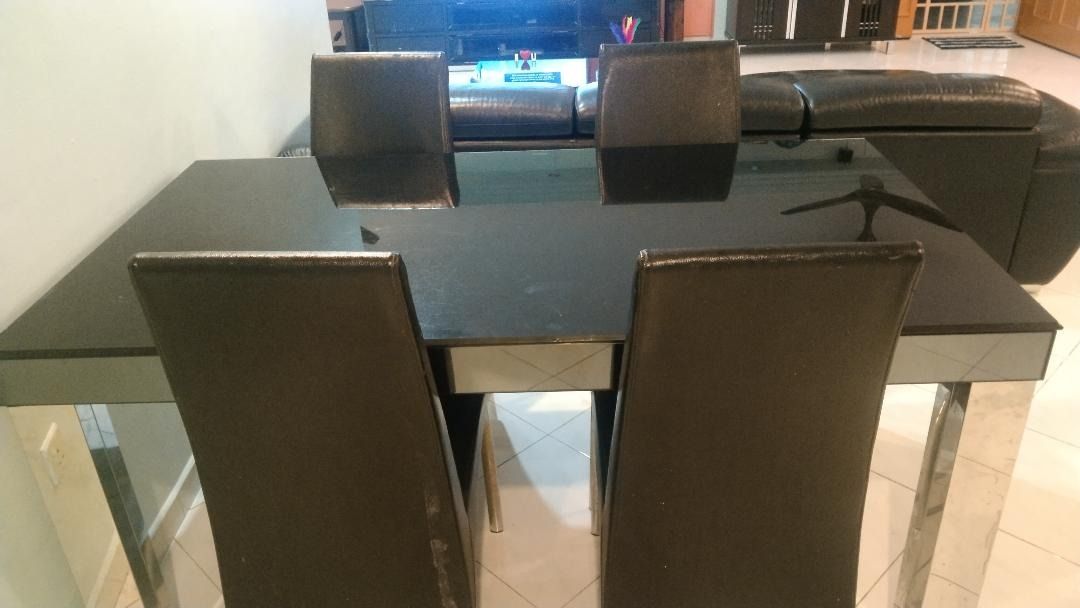 Solid Tampered Glass Dining Table with Steel Legs. Chairs are not ...