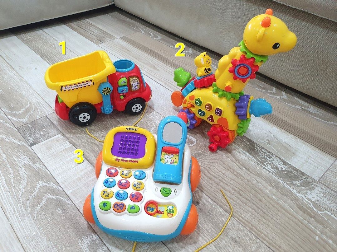 Toddler Kids Toys VTech Drop and Go Dump Truck VTech GearZooz Spin Laugh Gearaffe VTech My First Phone Hobbies Toys Toys Games on Carousell