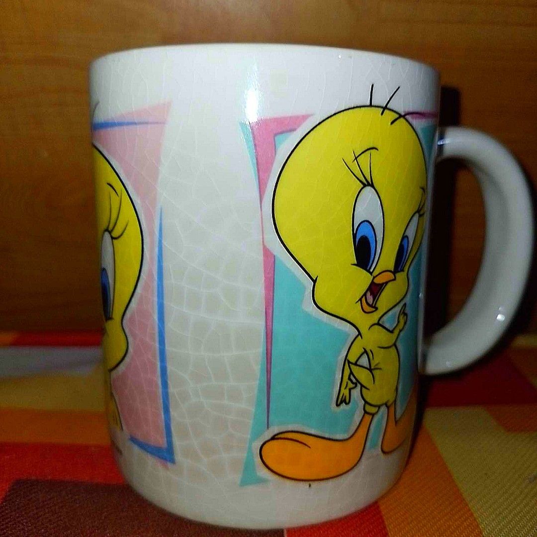 Tweety Bird Mug (Category: Coffee & Tea Tableware) located in Bacoor. Submitted by hazirannei (Listing ID 1246036804, Image 3). Description: Tweety Bird Mug *with crazing (visible cracks) MoP: GCash MoD: LBC Express or Buyer's preferred Courier if thru online booking. Shipping Fee at Buyer's expense..