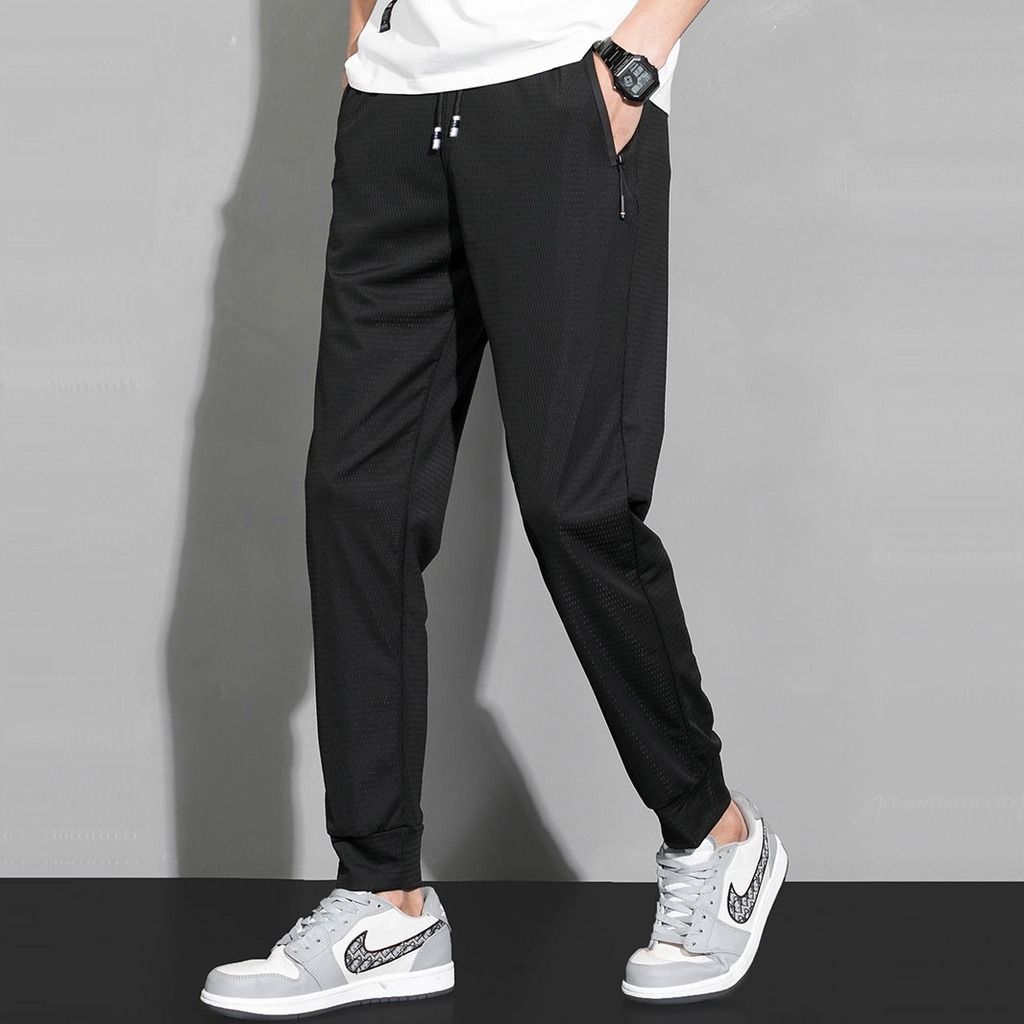 Men in cheap track pants