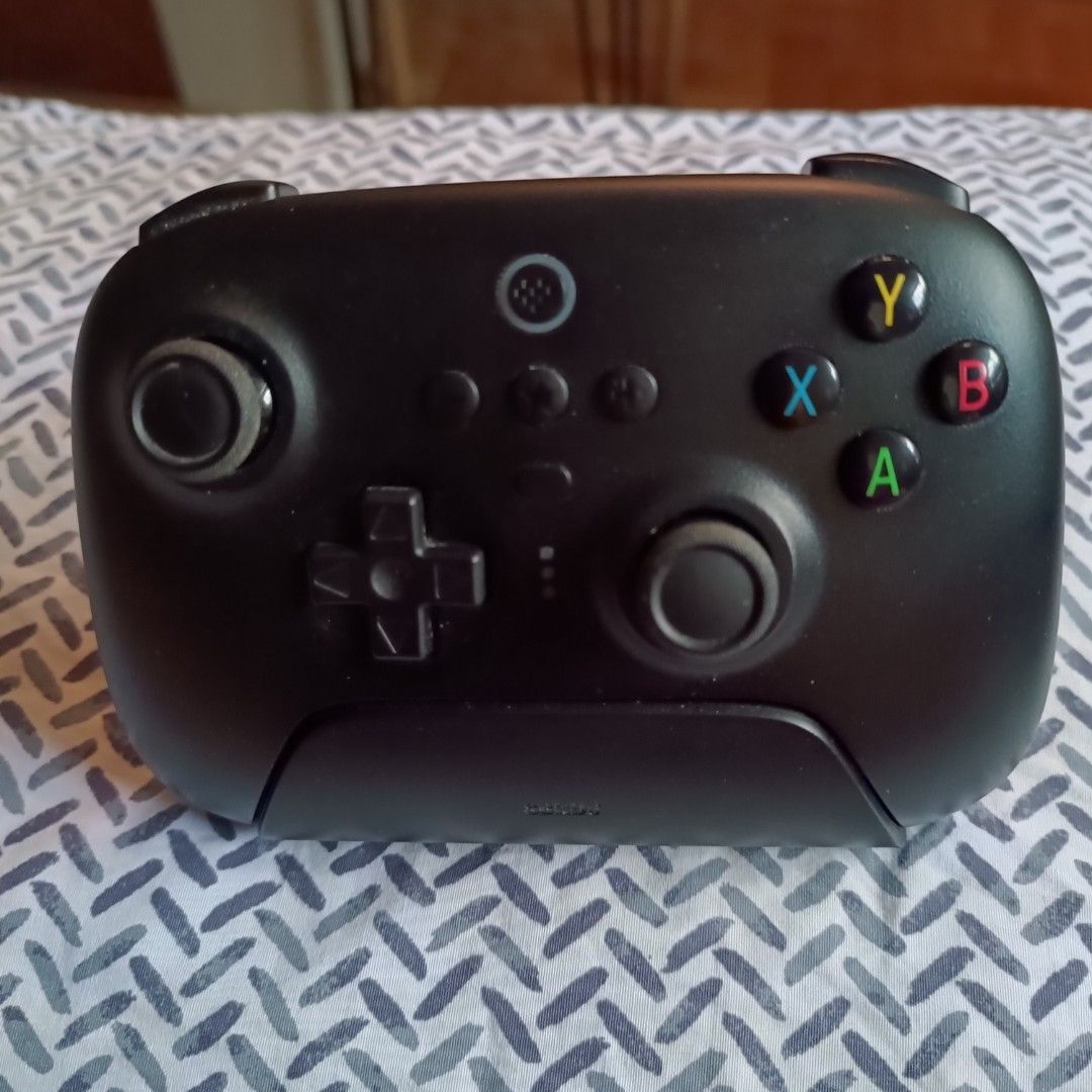8BitDo 2.4G Wireless Game Controller with Charging Dock for PC Android Windows 10/11 (Category: Controllers) located in Minglanilla. Submitted by labelsforlessph (Listing ID 1246262911, Image 2). Description: 8BitDo 2.4G Wireless Game Controller with Charging Dock for PC Android Windows 10/11 In excellent used condition Authenticity Guaranteed.