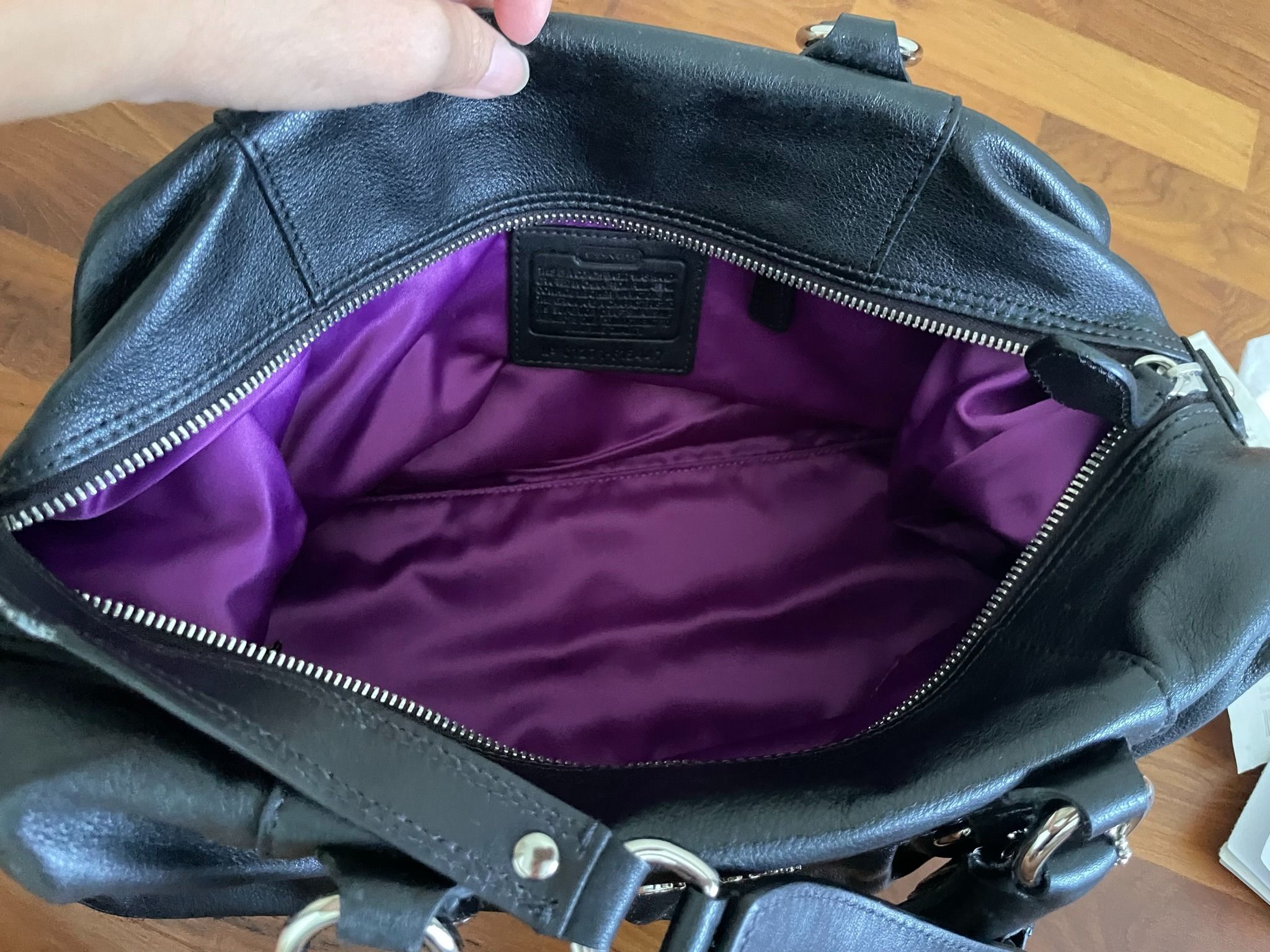 Purple and sales black coach purse
