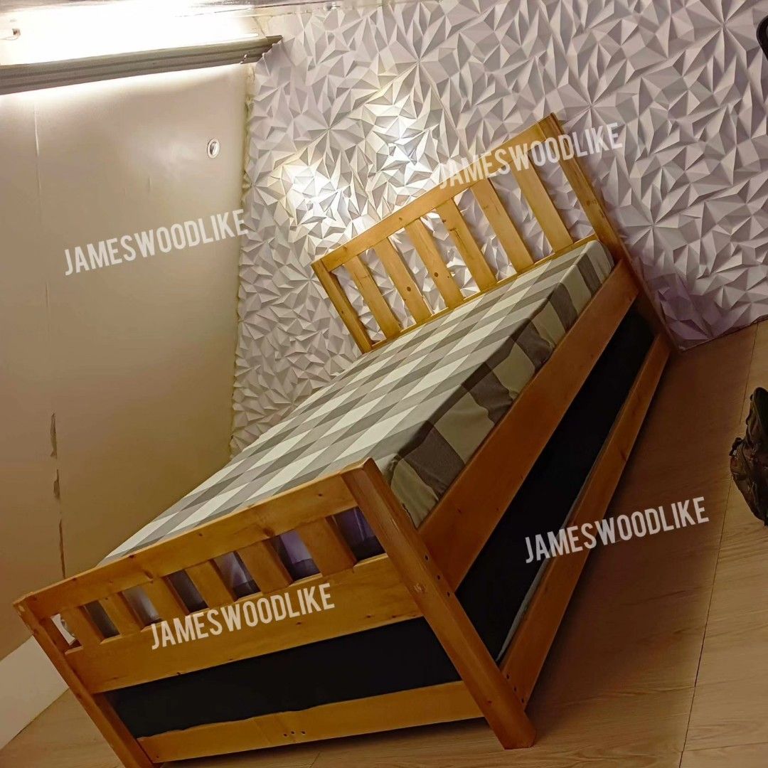BEDFRAME WITH PULL OUT BED (Category: Bed Frames & Mattresses) located in General Trias. Submitted by jameswoodlike (Listing ID 1246231573, Image 3). Description: "Let a SMILE be your umbrella in this Rainy day" 🌧️🤗 Smile ka naman dyan beshie Koh! 🤸🤸🤸 Here's an AFFORDA-TIBAY bed na mapapa smile ka tlga! Kasi GOOD BUY na GOOD BUY ka dito! 😁 ‼️ MESSAGE US NOW‼️ ✅ BF17 Bed design ✅ Semi double 48x75 Bed for the main bed ✅ Semi double 48x75 Bed