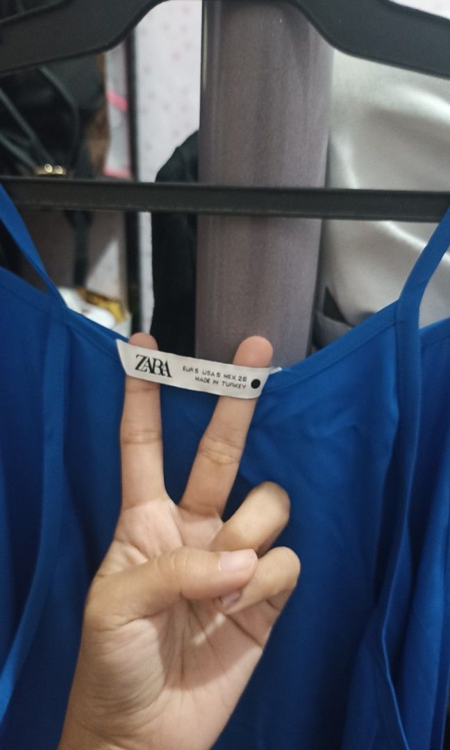 Zara Blue Halter Maxi Dress (Category: Dresses) located in Makati City. Submitted by mkgrcb (Listing ID 1246338818, Image 2). Description: Can't find any photo for this dress. But for reference, I'm 4'11 and mahaba siya for me :).