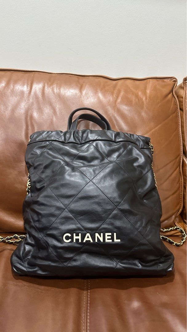 Chanel 22 backpack white cc logo, Luxury, Bags & Wallets on Carousell
