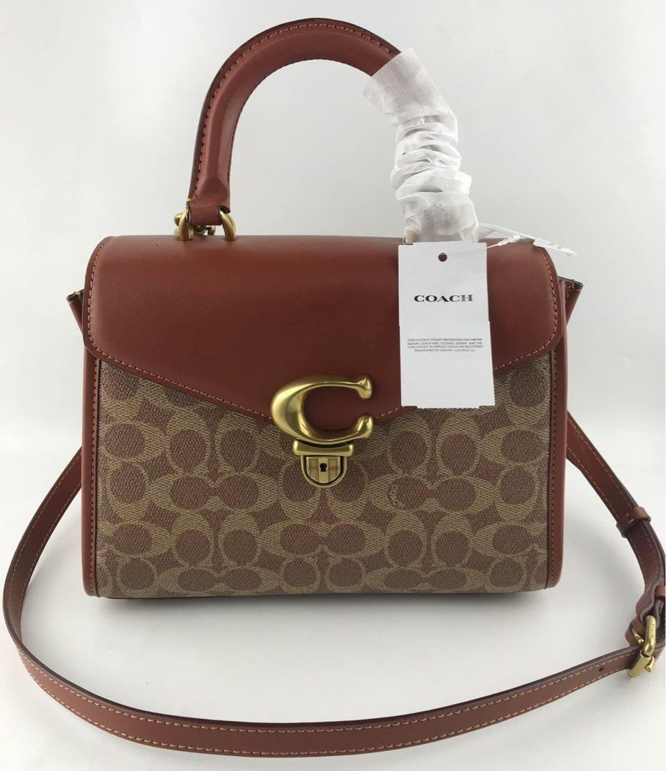 coach sammy tophandle (Category: Luxury Bags & Wallets) located in Pasig City. Submitted by mgmanila (Listing ID 1246371616, Image 1). Description: CCH Samy Top Handle Dimensions:24* 18* 11*cm 3,000 ✔️Cash on Pickup (COP) via LBC available ✔️Cash on Delivery (COD) available within Metro Manila only ✔️MOP: Gcash,Maya And Bank transfer ✔️Shipping via Lalamove, Grab and Joyride ✔️Yes to Same day delivery🥰 ✔️Open for Layaway 📩DM us for more info or