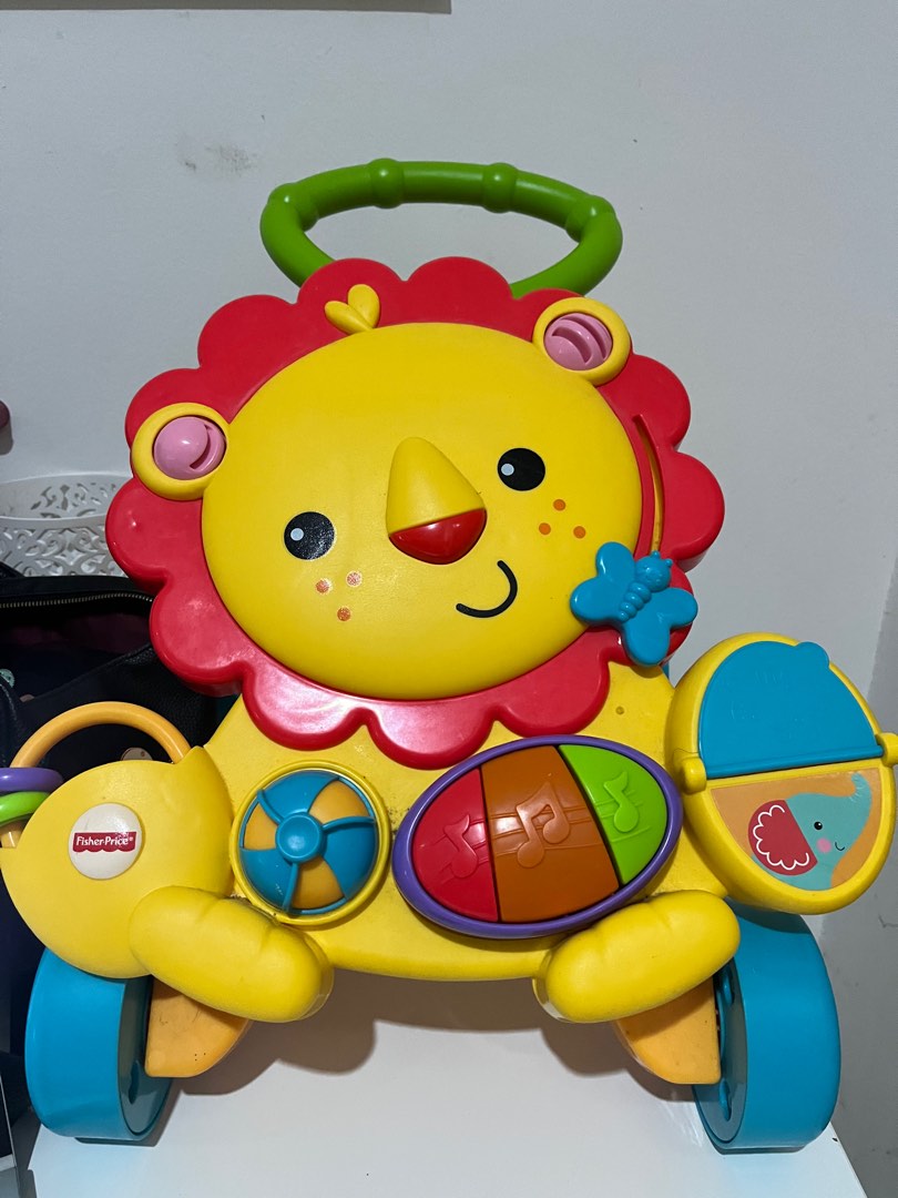 Harga fisher price musical lion walker sales