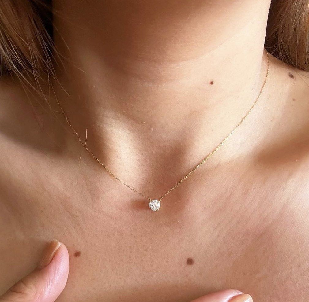 Gold necklace top with small diamond