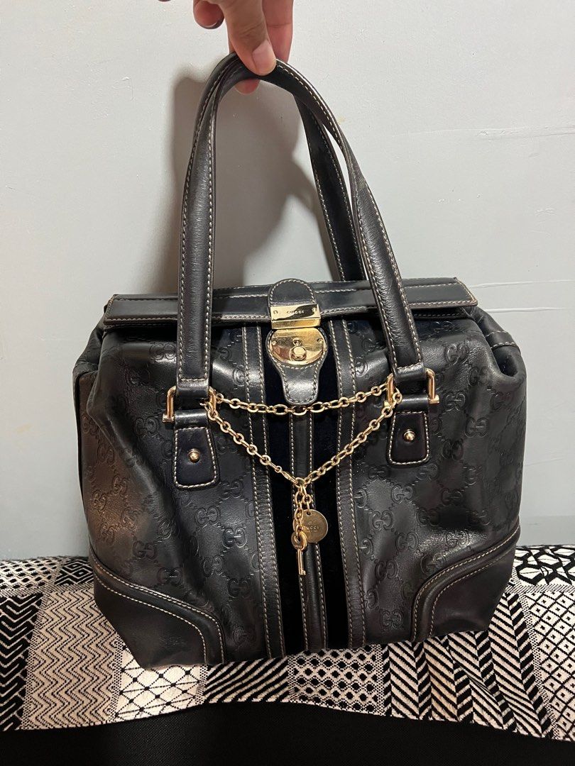 Gucci Guccissima leather Top Handle Bag (Category: Luxury Bags & Wallets) located in Binalonan. Submitted by sheenaluxarchive (Listing ID 1246218265, Image 2). Description: Rank Ab With minor flaws at the back Bawal sa sobrang selan Maganda pa ung bag Check photos. With key Selling price online $700 up equivalent to 40k+.