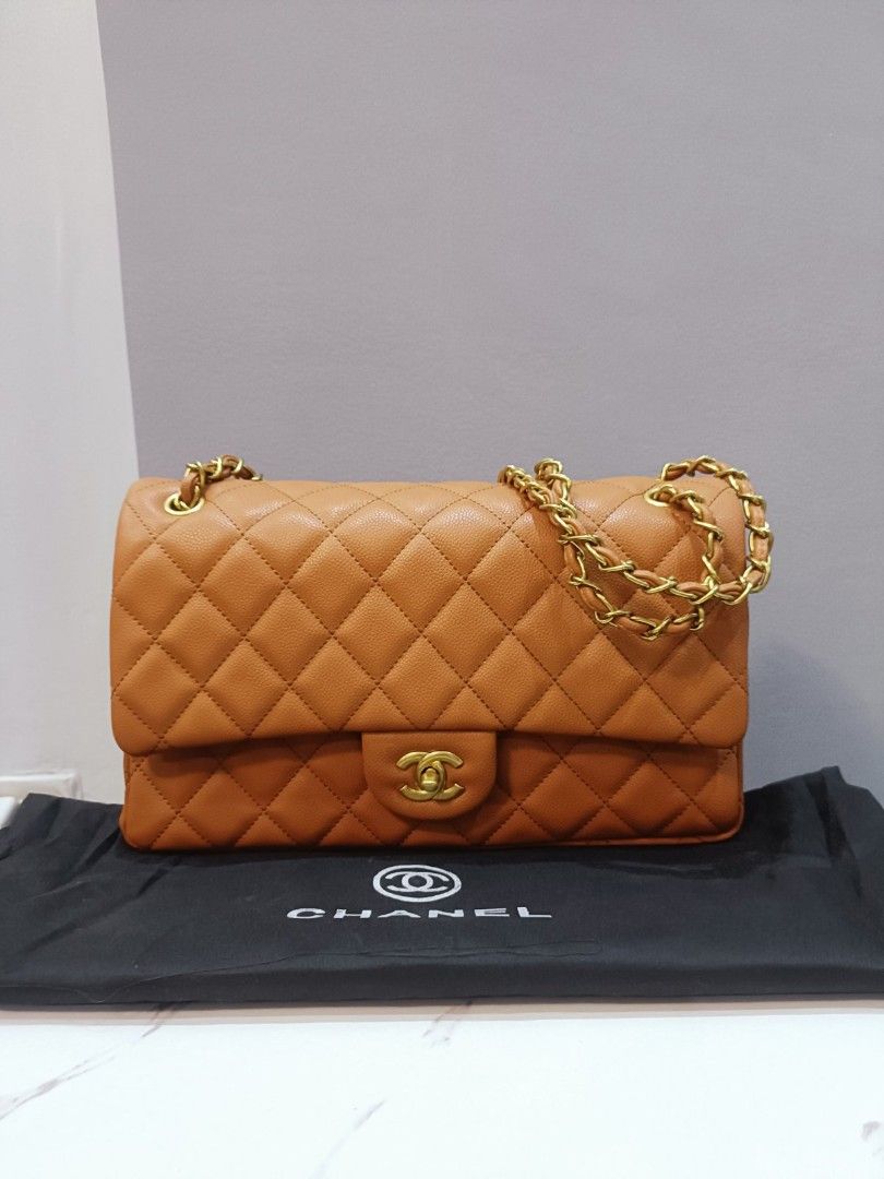 Japan Preloved Chanel Double Flap (Category: Luxury Bags & Wallets) located in Cebu City. Submitted by day.98 (Listing ID 1246354640, Image 1). Description: selected from japan Surplus caviar leather genuine leather with holo sticker 32cm no flaws.