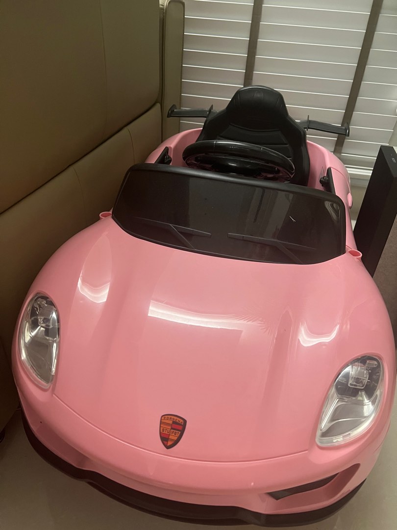 Pink porsche ride on sale car