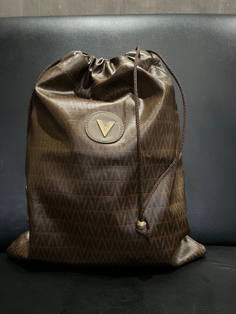 Mario Valentino bundle (Category: Luxury Bags & Wallets) located in Candelaria. Submitted by welllovebyaive (Listing ID 1246269987, Image 2). Description: No flaws just sign of use ❤️ 2 clutch type 1 drawstring type.