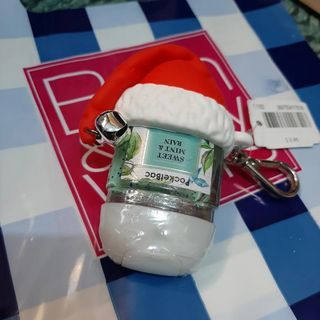 Pocketbac holder and sanitizer refill