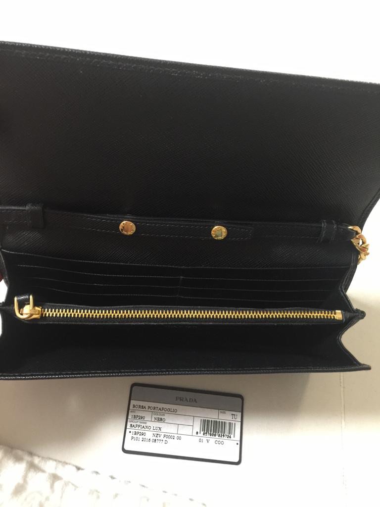 Prada wallet on chain, Luxury, Bags & Wallets on Carousell