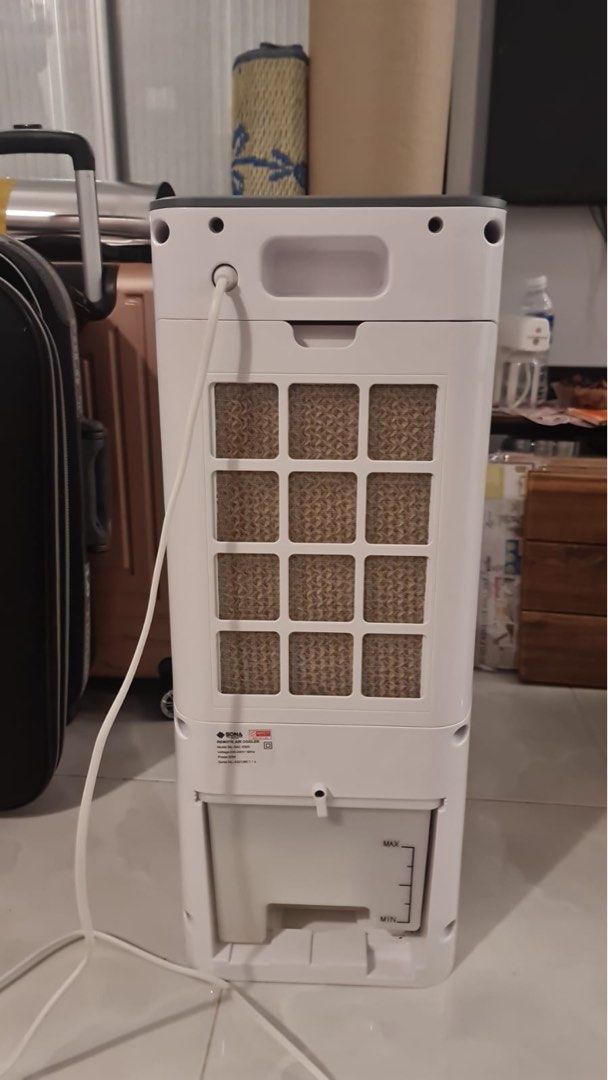 Sona Air Cooler (Category: Air Conditioners & Heating) located in Singapore. Submitted by imranpzi (Listing ID 1246352621, Image 2). Description: Wheels , Remote control and Ice bricks included ..