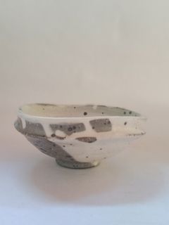 Speckled irregular shaped stoneware bowl